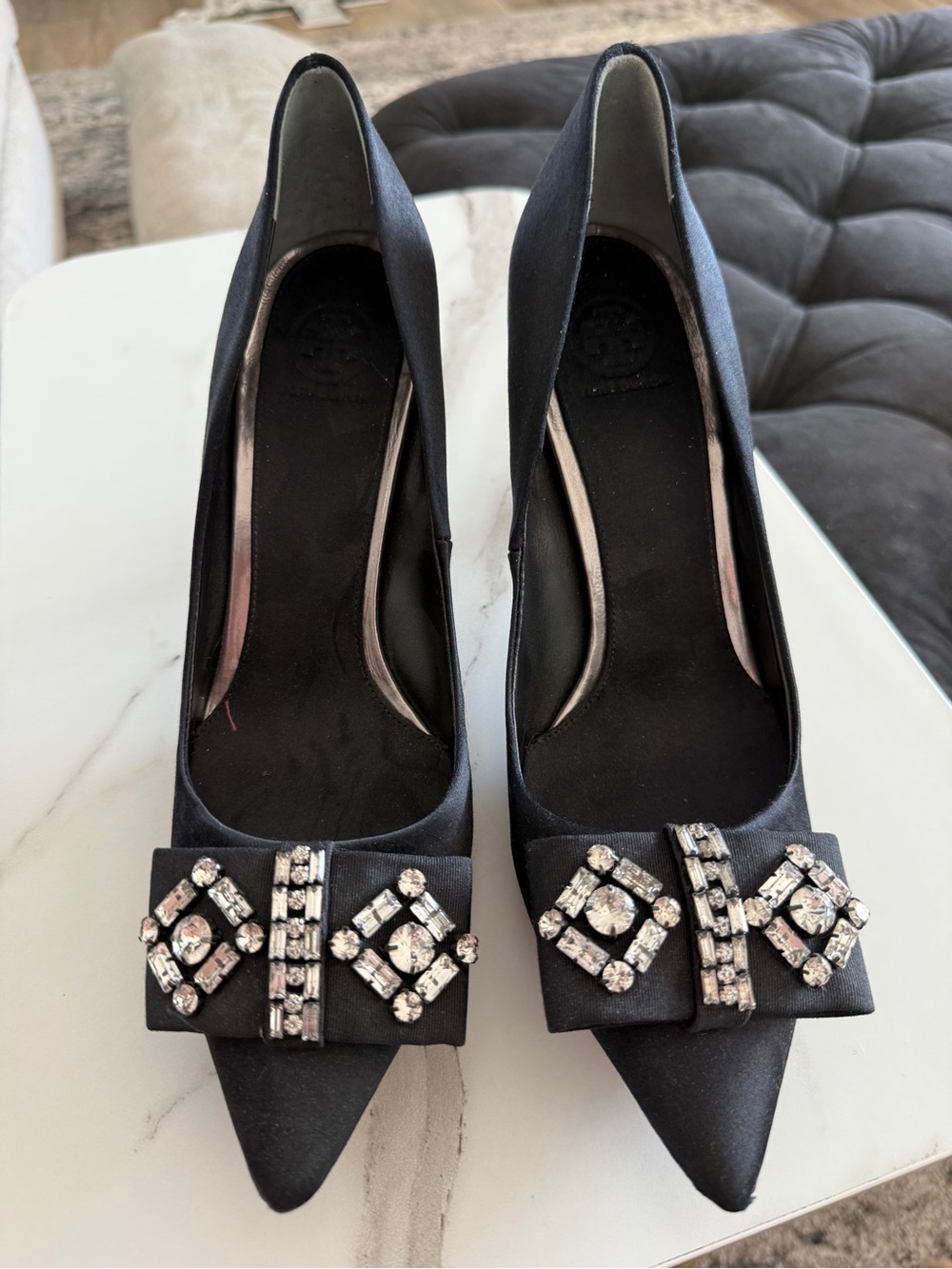 Elegant Black Pointed Toe Pumps with Crystal Bow Accent TORY BURCH